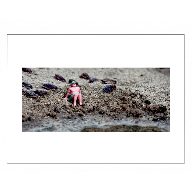 Doll man on the beach. Photo art. Photo poster.